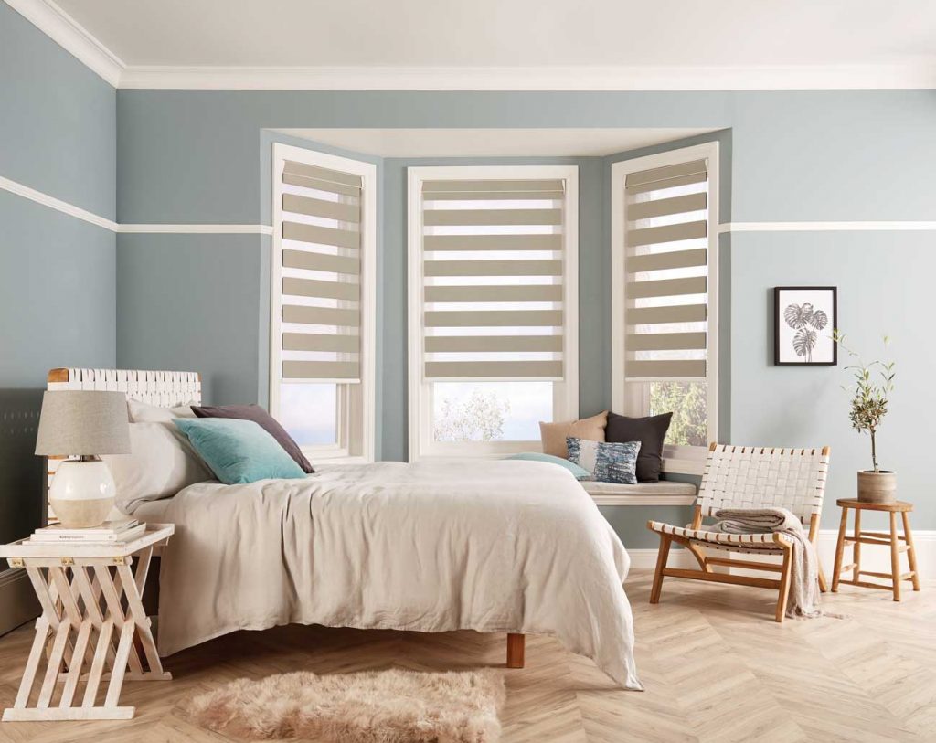 Cream vision blinds in the bedroom