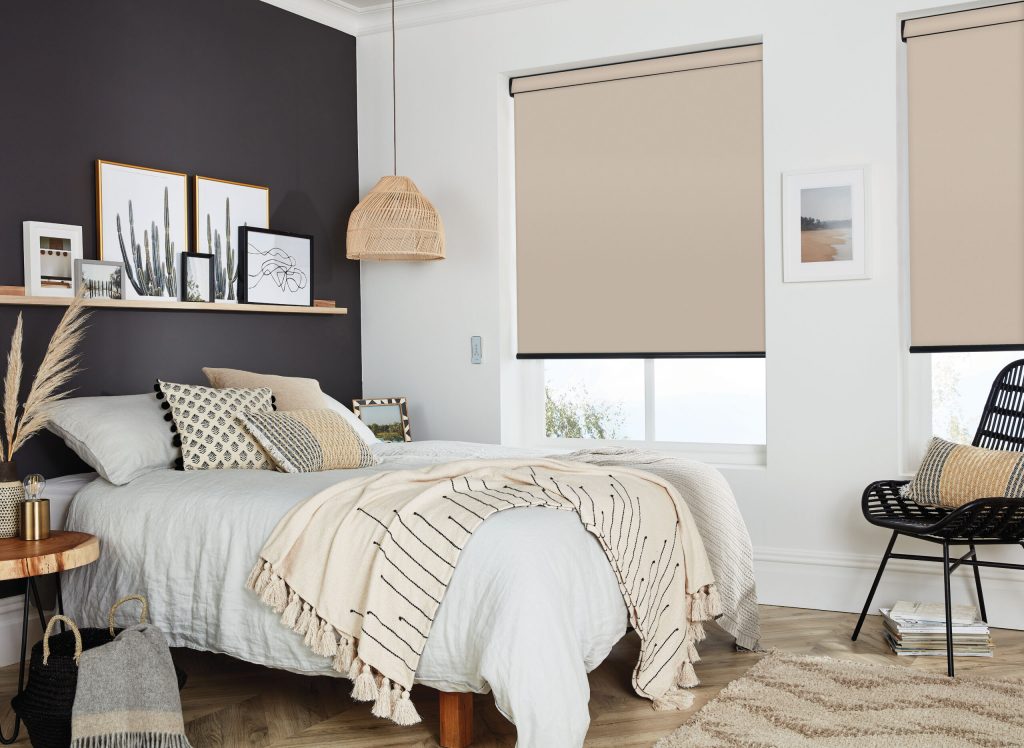 Cream roller blind in a bedroom